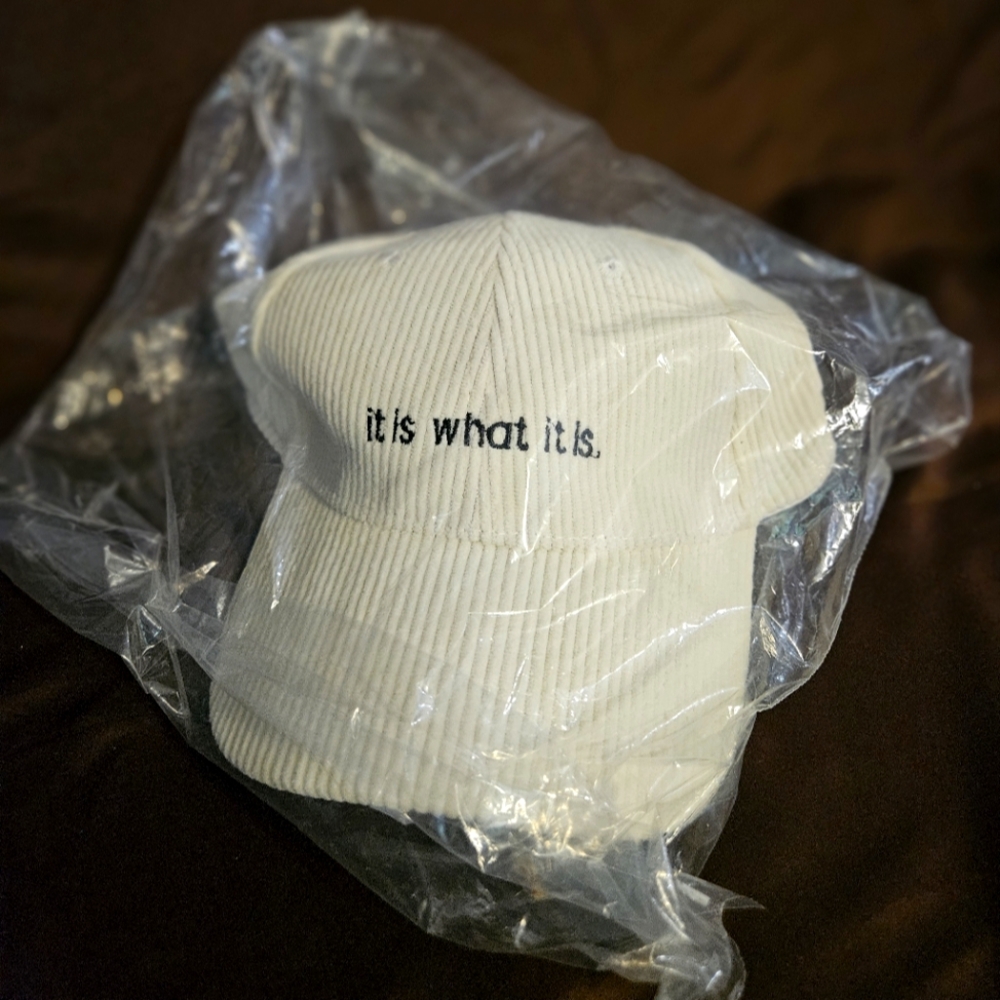 Cream Corduroy “It Is What It Is.” Embroidered Baseball Cap